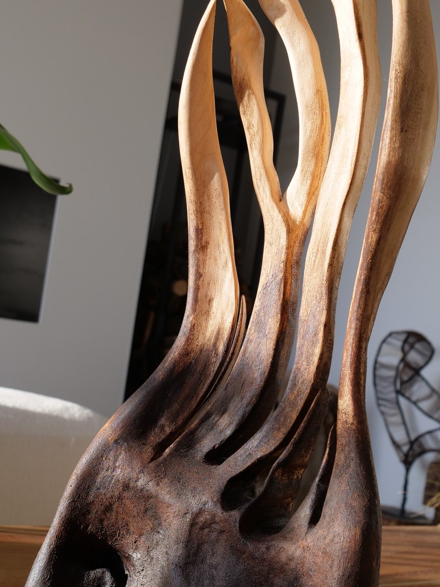 Brasier, détail des langues de bois